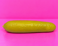 Giant Pickle Squishy on pink background
